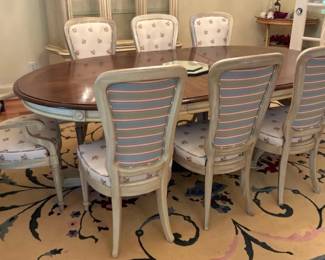 04 Oval Dining Table with Eight Matching Upholstered Chairs Custom Rug