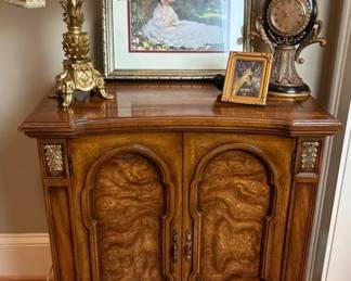 Wood Accent Cabinet with Lamp, Clock and Framed Artwork