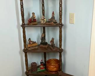 Wooden Corner Shelf with Figurines and Framed Artwork