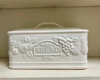 White ceramic bread box with lid and raised fruit design