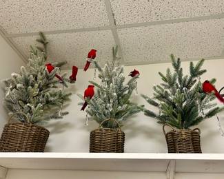 Three decorative evergreen arrangements 