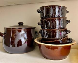 Assorted brown glazed stoneware cookware