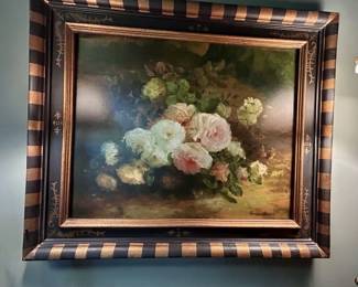 Signed floral oil painting in a decorative black-and-gold frame.