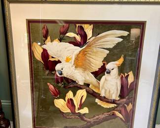 Framed artwork featuring two white cockatoos 