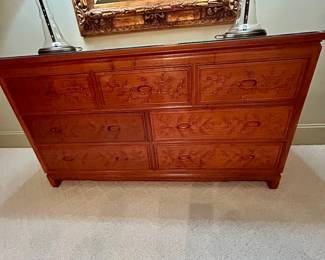 Asian-style carved seven-drawer dresser with bird-and-blossom detailing
