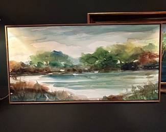 Framed watercolor-style landscape depicting a quiet pond and tree-lined shore.