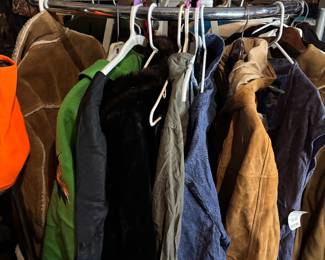 vintage clothes and coats. Very stylish ones. These have been stored for years. over 6 full racks of vintage and modern clothes lots of nwt