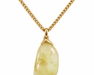 Colar dourado com pingente de citrino organico