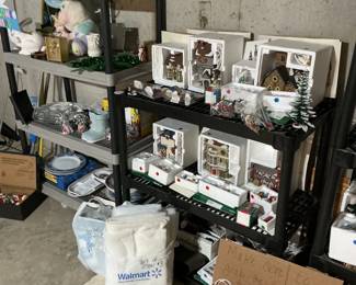 Shelves full of Dept 56 Dickens Village Pieces
