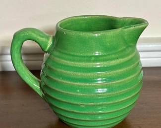 011 greenribbedpotterypitcherintheart