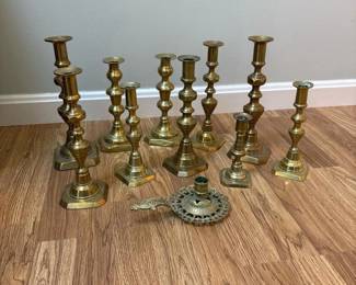 347 collectionofbrasscandlesticksandorn