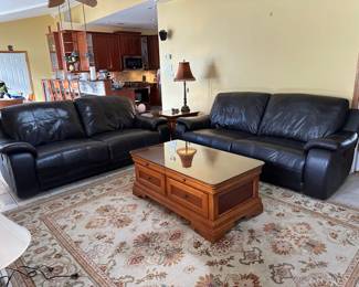 Pair of Chocolate Brown Leather Power Reclining Sofas, Coffee Table, Carpet