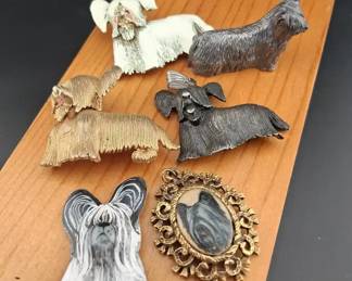 Sterling, Pewter And Enameled Terrier Brooches And Pendants
