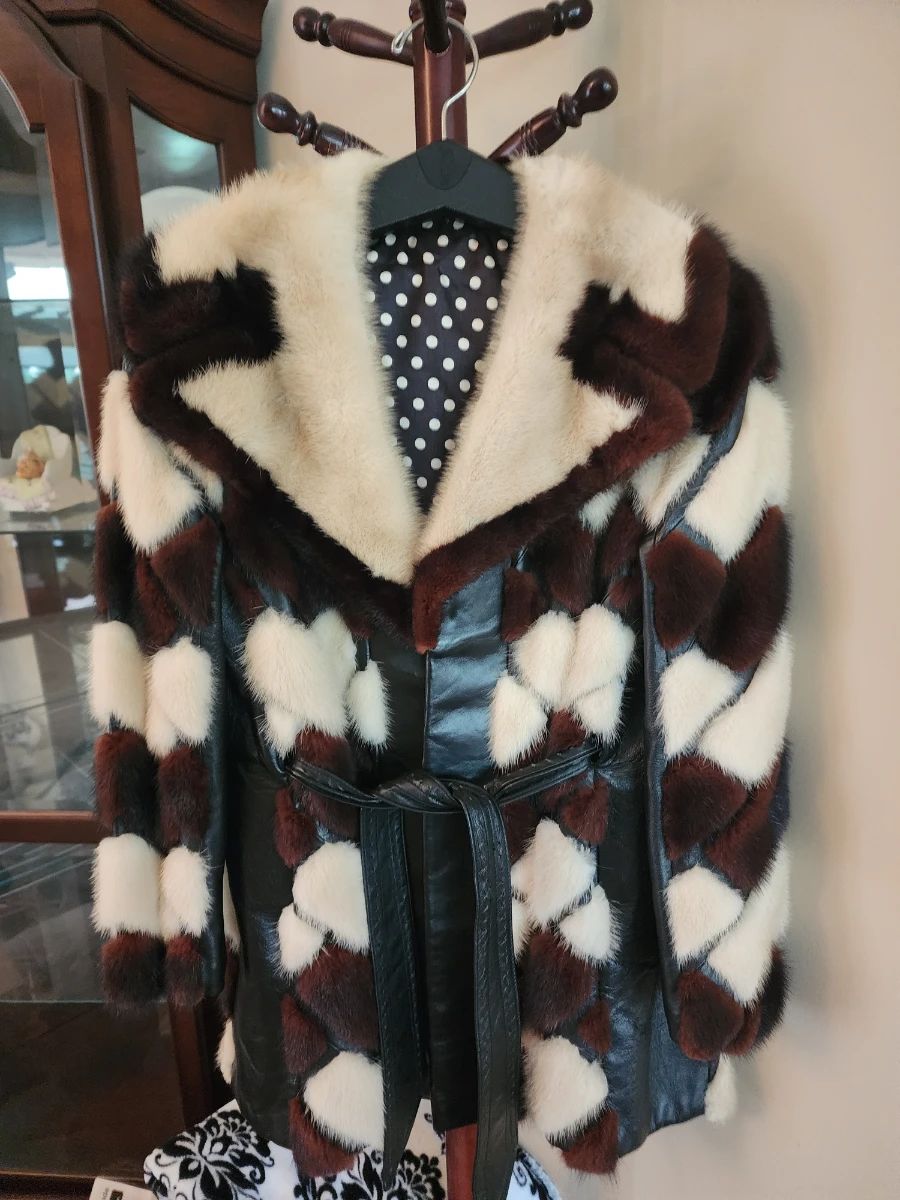 Vintage 1060's-1970's geometric patchwork Mink fur and leather coat! The family would like a firm price at 600.00.