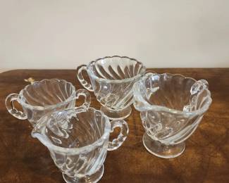 2 cream and sugar sets