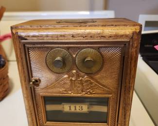 Antique U.S. post office box converted into a piggy bank
