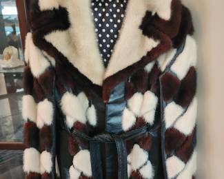 Vintage 1060's-1970's geometric patchwork Mink fur and leather coat! The family would like a firm price at 600.00.