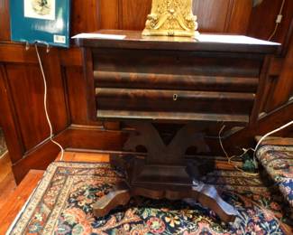 A WOnderful Figured 2 Drawer Mahogany that is American Empire dating from the 1820s - 1840s