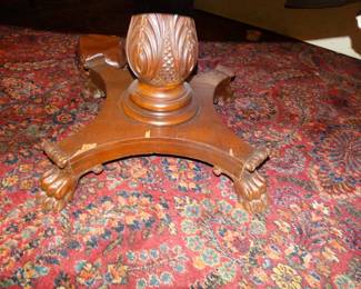 The Carved Base of the Lg Round Mahogany table that the Previous Carpet supports