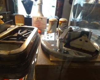 That's anAntique Rolls Razor to Left and the Right is a mechanical strop