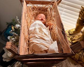 Life size Baby Jesus in manger