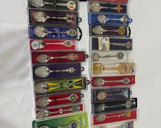 Spoon souvenir of International. Mix of various metals and some of silver plated