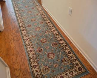 Persian-style hallway runner rug, sage blue with floral pattern
