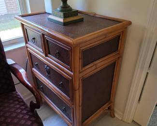Bamboo and rattan 4-drawer chest with green toleware lamp