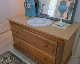 Pine 2-drawer dresser with blue mirror, clock and lamp