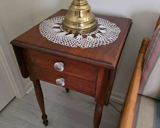 Drop-leaf side table, glass knobs, turned legs, crochet doily