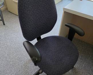 Ergonomic rolling office chair with adjustable arms, navy fabric