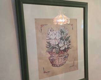 Framed floral still life print, green frame with matting