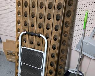 Rustic wood riddling rack (wine display), step stool, planters