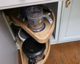 Corner lazy Susan cabinet with blender and small appliances