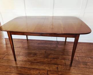 This gorgeous MCM dining table comes with three leaves .. no leaf 82Lx42 D X29L