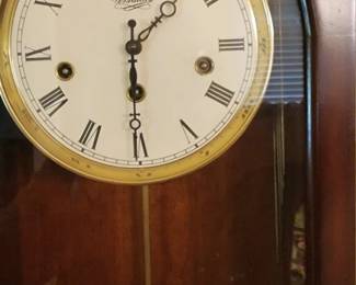 Wall clock with key