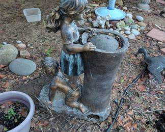 Girl/Boy Water Fountain.  Unsure if it works