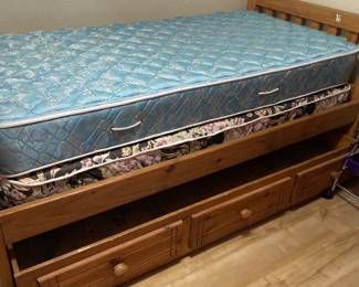Twin bed with bed drawer open