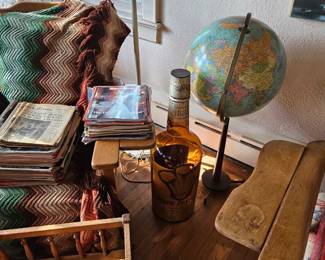 Magazine rack, vintage globe, large antique promotional whiskey bottle