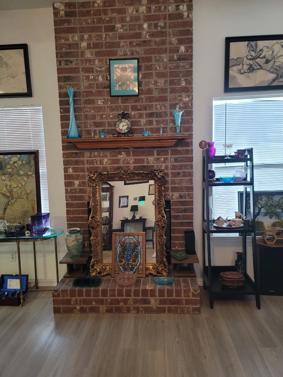 Blue Swung Vase, Large Gold Framed Mirror, 4 Tier Shelf