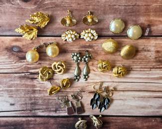Vintage costume earrings in floral, pearl-style, gold-tone and colorful decorative designs.