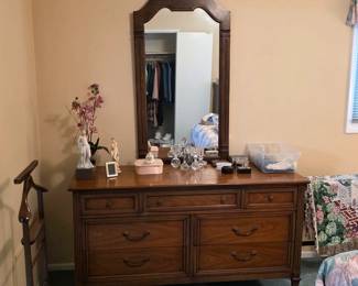 Vintage wood dresser with mirror from the bedroom furnishings bearing a Bullock’s retailer label.