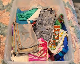 Vintage scarves and handkerchiefs in floral, geometric and colorful printed patterns.