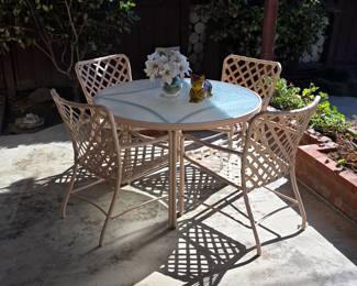 Vintage patio furniture set with glass top table