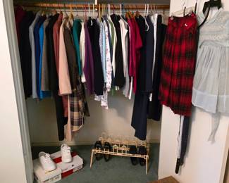 Women’s clothing assortment with jackets, tops, dresses, skirts and coordinated separates.