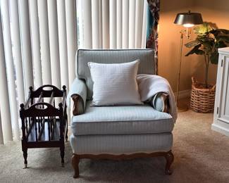 Vintage upholstered armchair, wood magazine rack and traditional lighting at our Fullerton estate sale