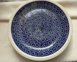 Polish pottery plate from Bolesławiec featuring the intricate blue-and-white "Daisy Dreams"