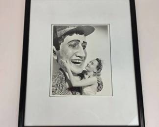 Lot #B43 - Black-and-White Photograph American Ventriloquist Paul Winchell w/ Giant Prop Head of Dummy Jerry Mahoney, + Woman