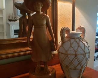 Wooden girl statue