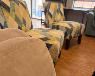 2 beautiful accent chairs. The legs need tightening…. That’s what he said…. Lol